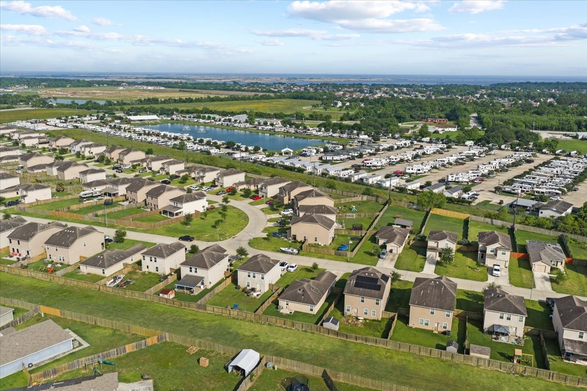 5727 Treasure Cove Road Cove, TX 77523 - Photo 19 of 20 an aerial view of residential houses with outdoor space