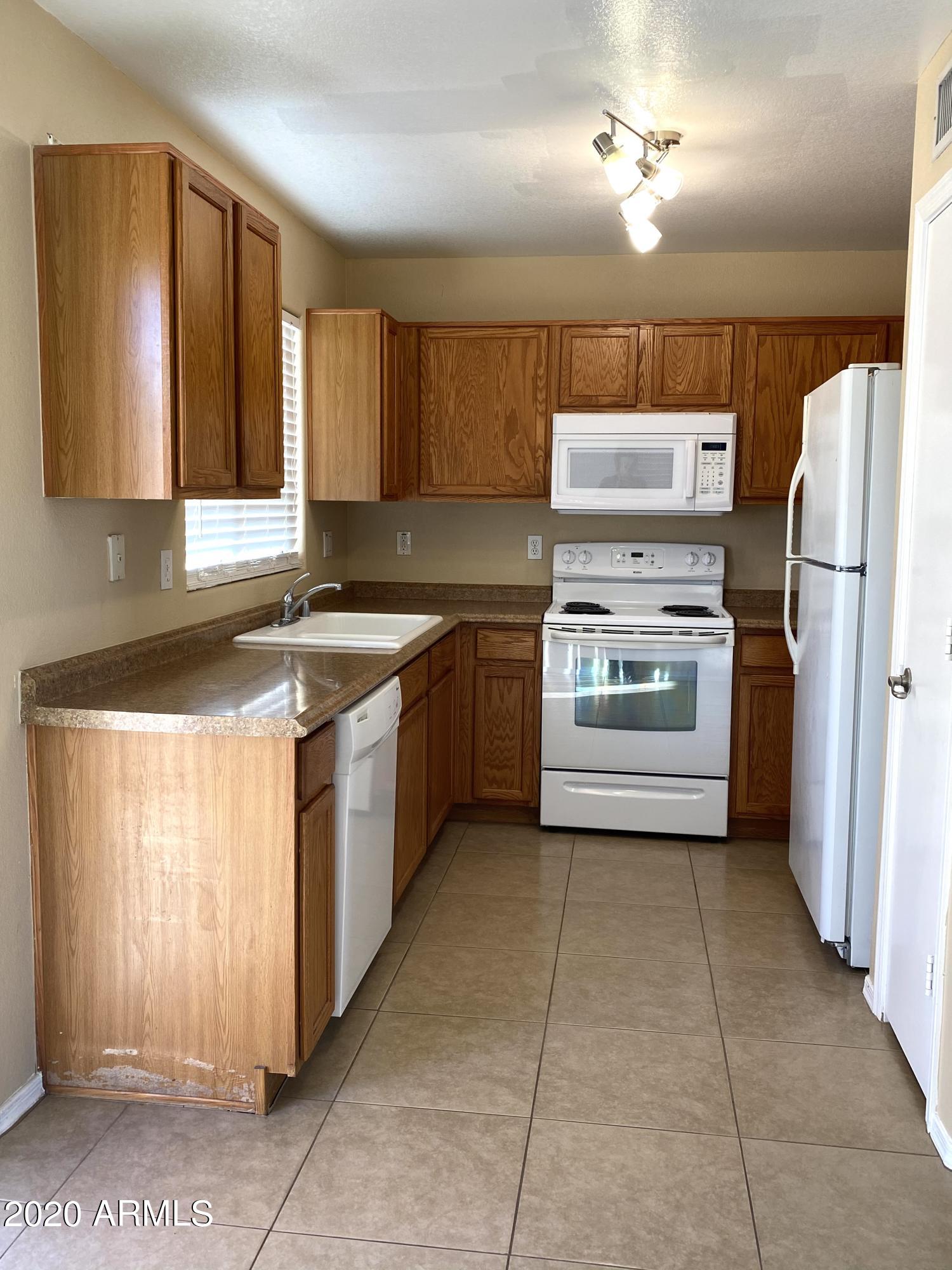 3423 West Shumway Farm Road Phoenix, AZ 85041 - Photo 5 of 16 IMG_5054