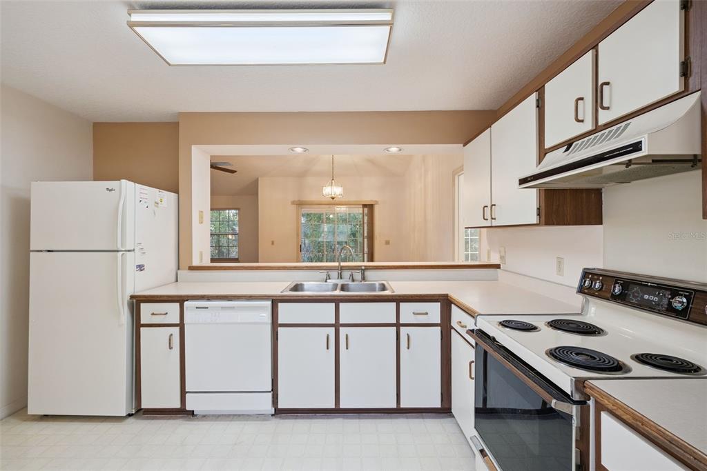 1193 Glen Falls Road DeLand, FL 32720 - Photo 11 of 20 a kitchen with cabinets and appliances