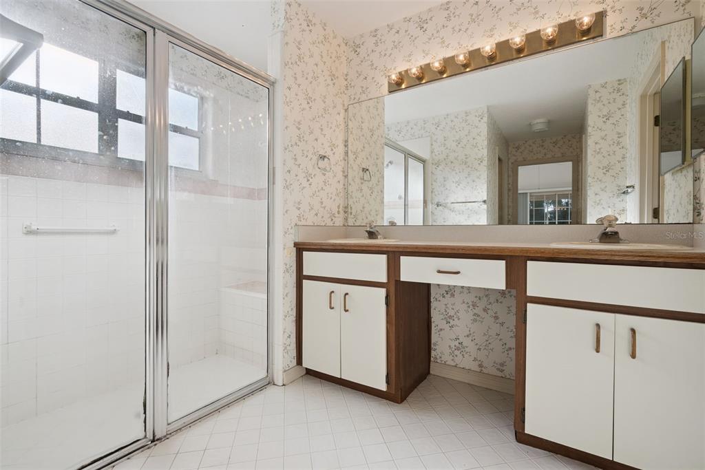 1193 Glen Falls Road DeLand, FL 32720 - Photo 13 of 20 view of a bathroom with a sink and mirror