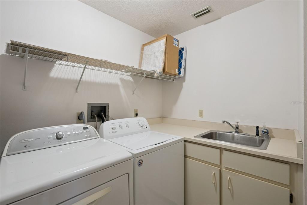1193 Glen Falls Road DeLand, FL 32720 - Photo 18 of 20 a utility room with dryer and washer