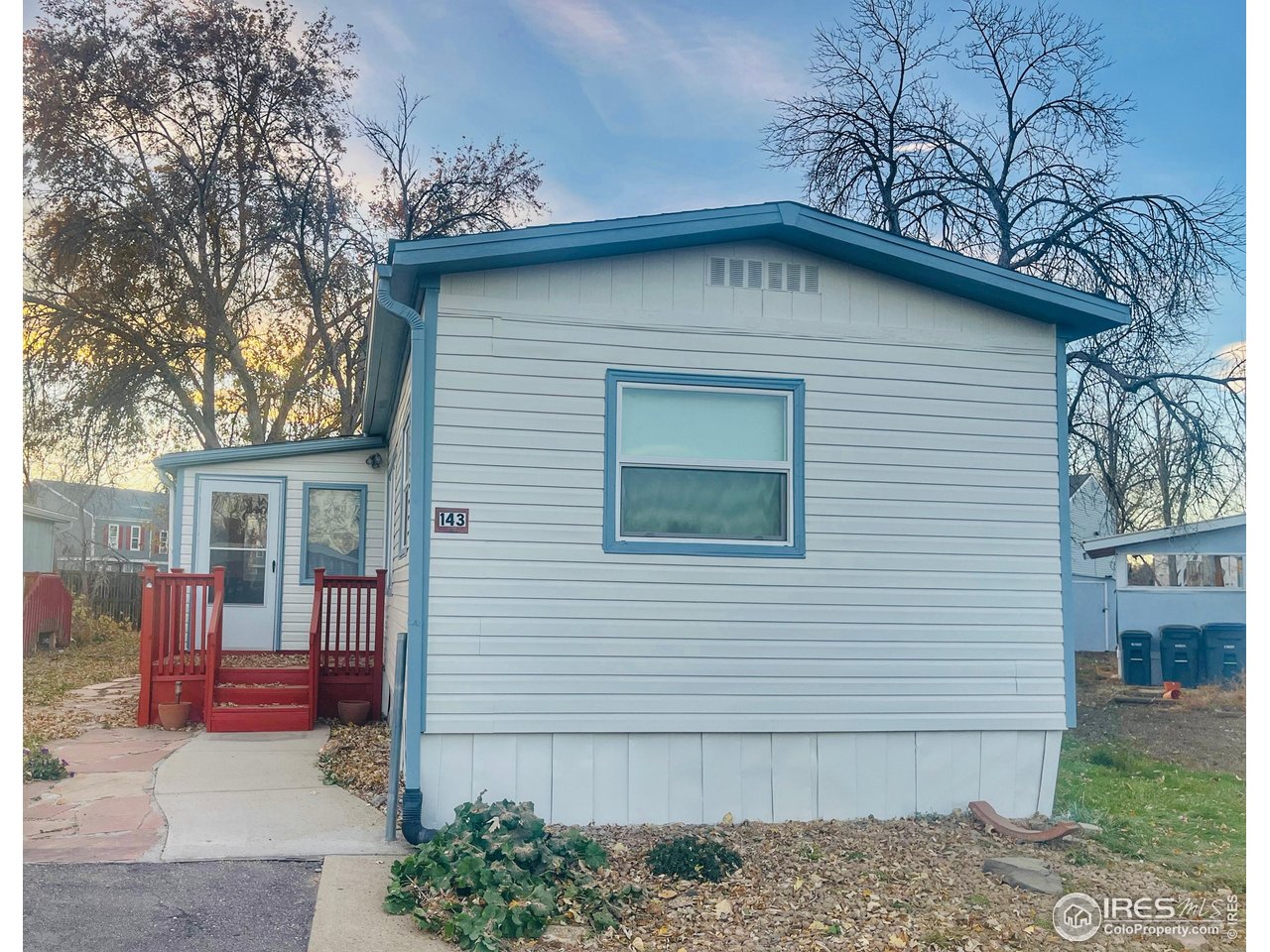 11990 East South Boulder Road, Unit 143 Lafayette, CO 80026 - Photo 2 of 19 a house with a outdoor space