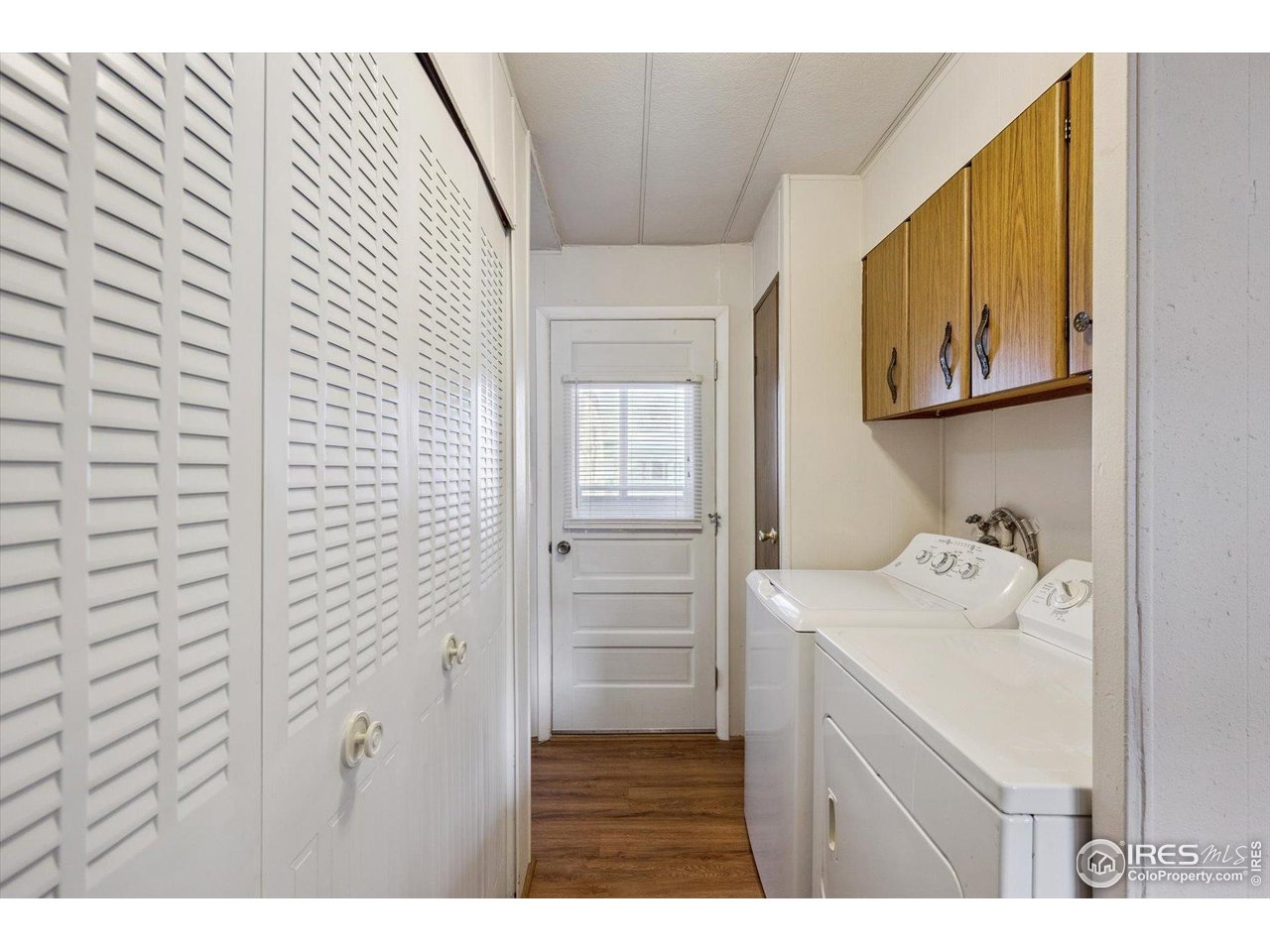 11990 East South Boulder Road, Unit 143 Lafayette, CO 80026 - Photo 7 of 19 a bathroom with a sink and a mirror