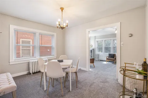 a view of a livingroom with furniture and windows