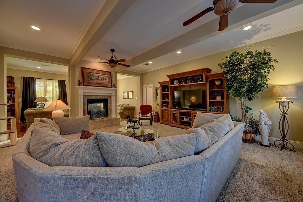 8456 Schuster Road Ledbetter, TX 78946 - Photo 15 of 49 a living room with furniture and a fireplace