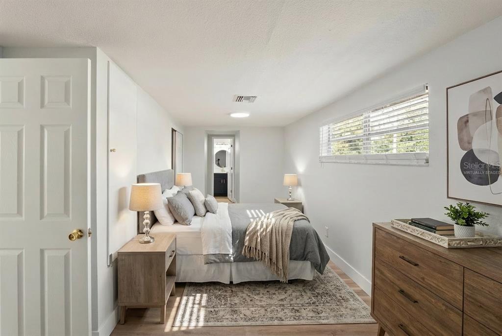 2213 West Ohio Avenue Tampa, FL 33607 - Photo 11 of 21 a bedroom with a bed and a window