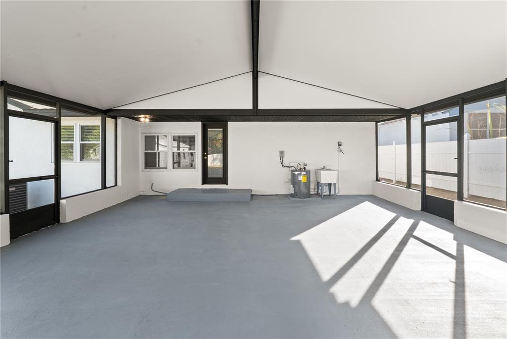 2213 West Ohio Avenue Tampa, FL 33607 - Photo 18 of 21 a view of a living room and a balcony