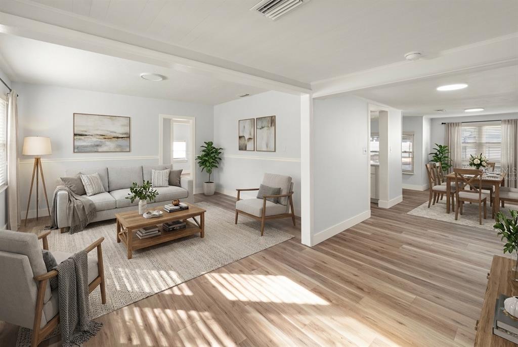 2213 West Ohio Avenue Tampa, FL 33607 - Photo 2 of 21 a living room with furniture and a table