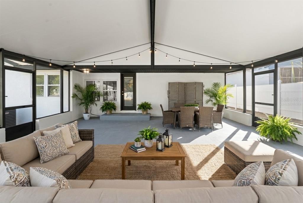 2213 West Ohio Avenue Tampa, FL 33607 - Photo 3 of 21 a living room with furniture and a large window