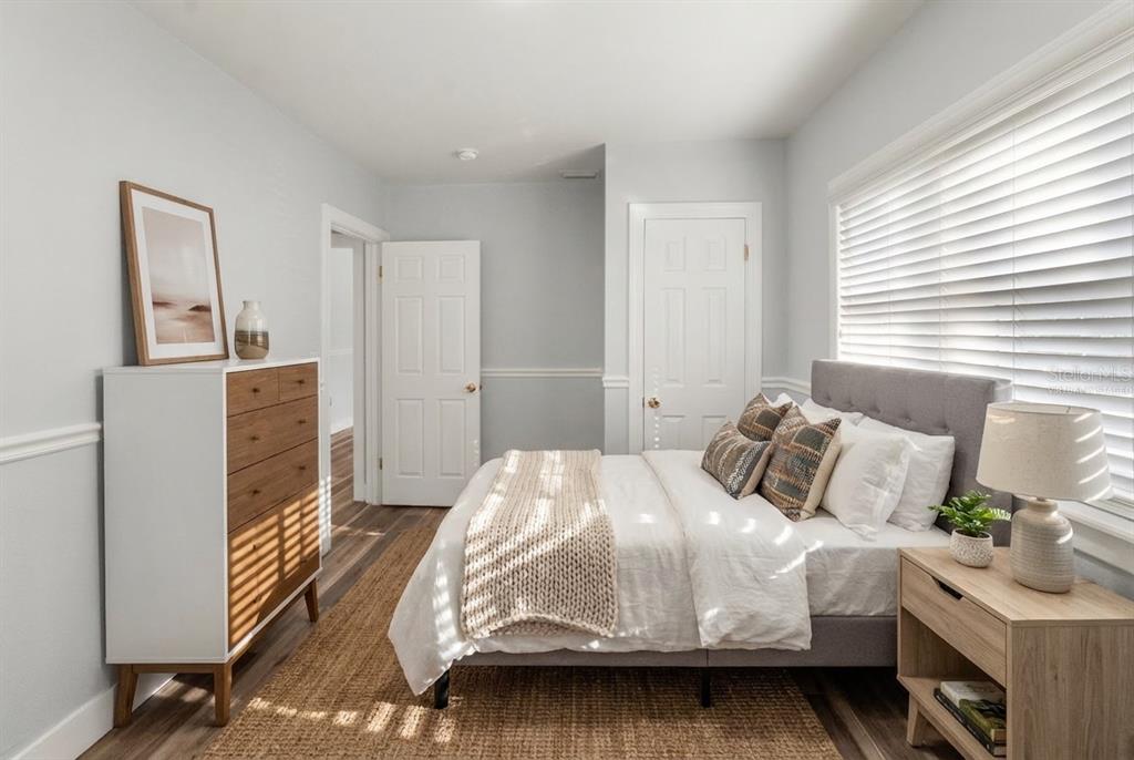 2213 West Ohio Avenue Tampa, FL 33607 - Photo 5 of 21 a bedroom with a bed and a dresser