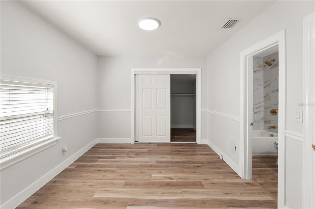 2213 West Ohio Avenue Tampa, FL 33607 - Photo 8 of 21 a view of an empty room and window