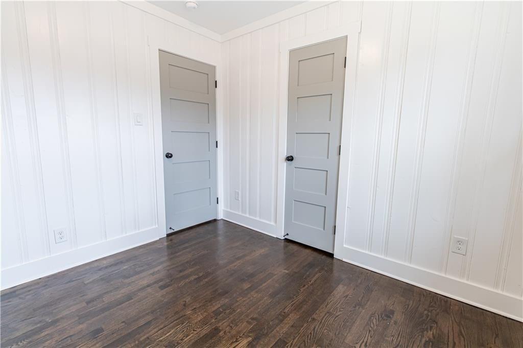 3548 Glensford Drive Decatur, GA 30032 - Photo 15 of 47 an empty room with wooden floor & closet area
