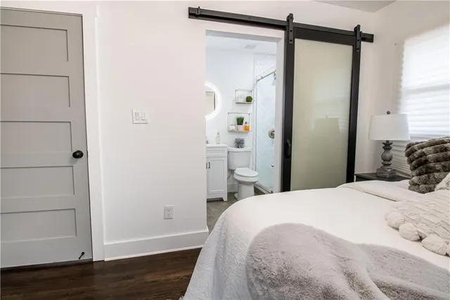 a bathroom with a toilet and a sink
