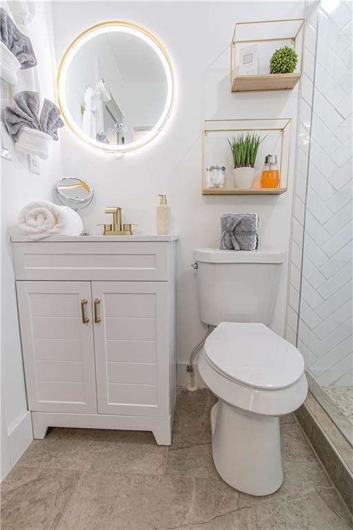 3548 Glensford Drive Decatur, GA 30032 - Photo 22 of 47 a bathroom with a toilet and a sink