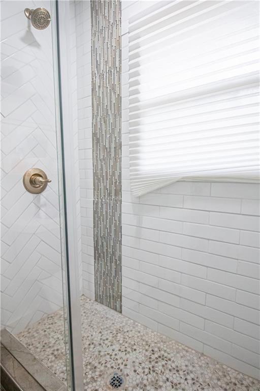 3548 Glensford Drive Decatur, GA 30032 - Photo 23 of 47 a bathroom with a shower