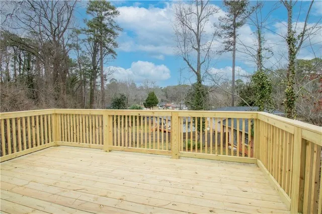 a view of balcony with wooden floor