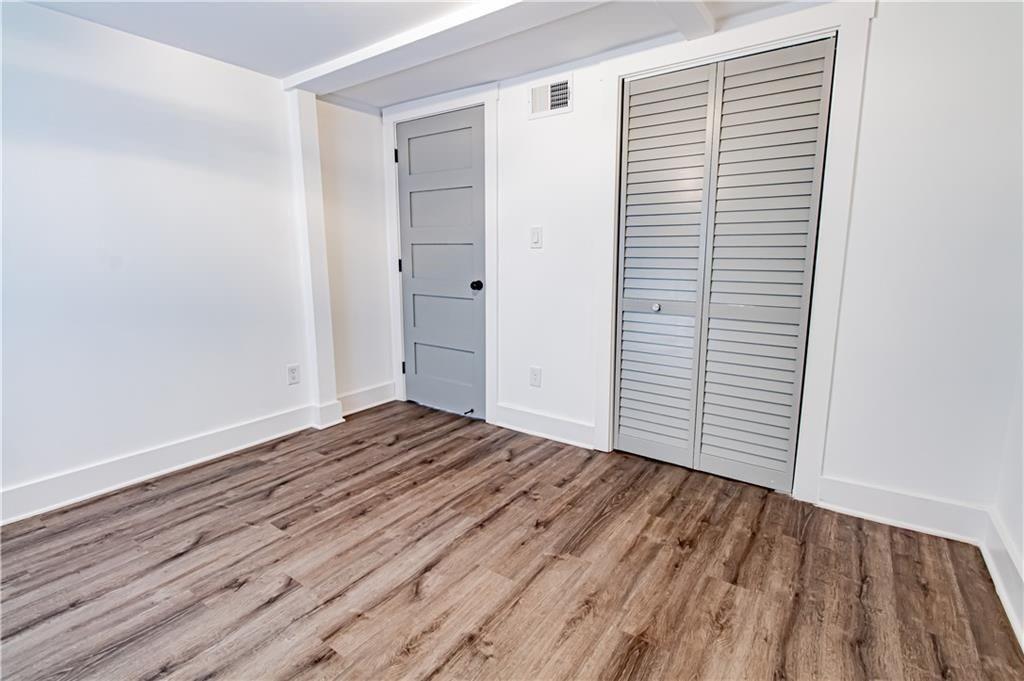 3548 Glensford Drive Decatur, GA 30032 - Photo 34 of 47 wooden floor in an empty room