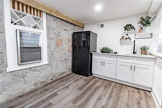 a front view of a house with garage