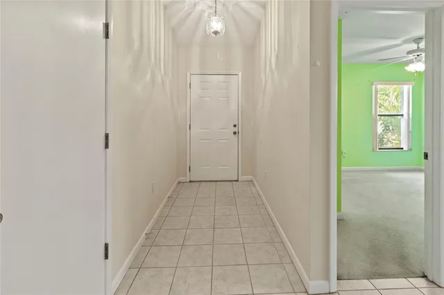 a balcony with furniture and wooden floor