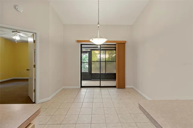 a view of a kitchen with a sink and cabinets