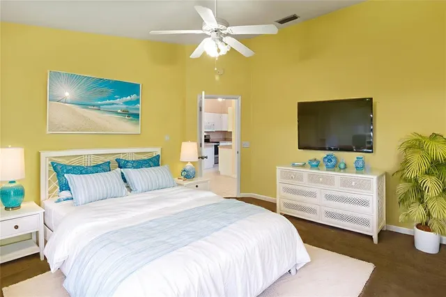 a bedroom with a bed and a furniture