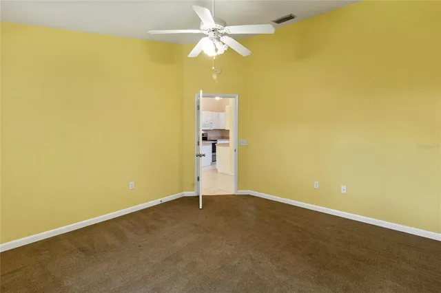 a bathroom with a sink mirror toilet and shower