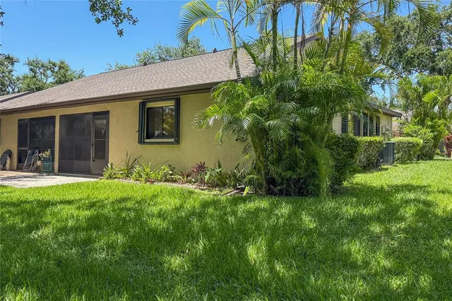 a view of front of house with a yard