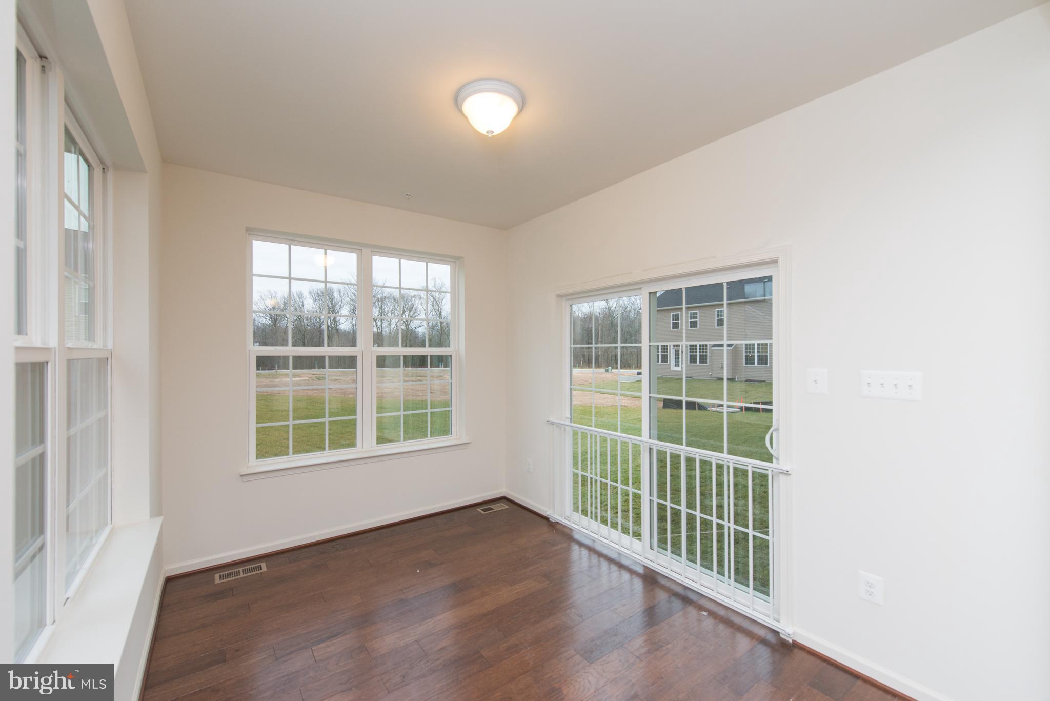 972 Morgan Run Road Baltimore, MD 21220 - Photo 16 of 30 Sunroom with hardwood flooring