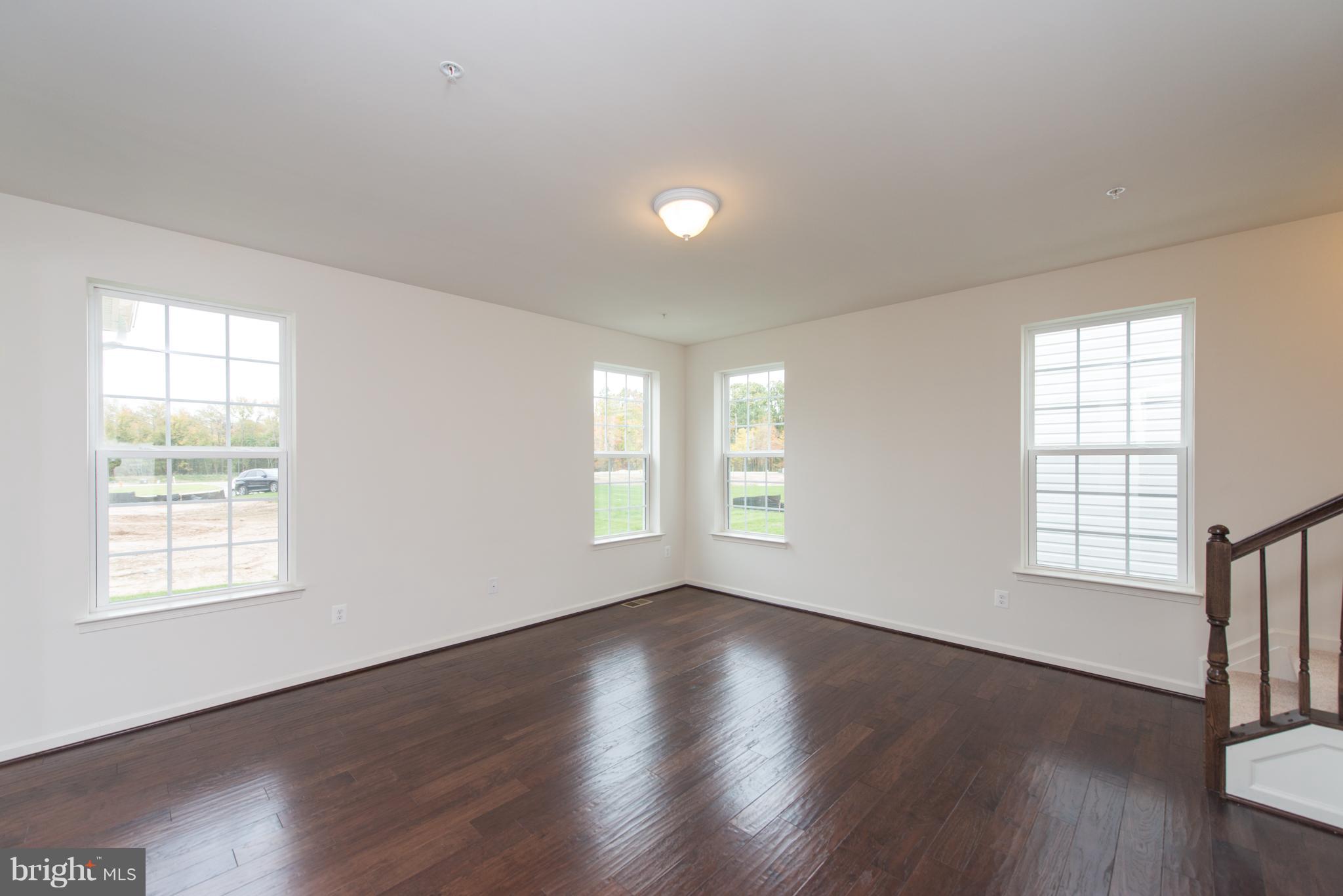 972 Morgan Run Road Baltimore, MD 21220 - Photo 9 of 30 Family Room with Hardwood Floors