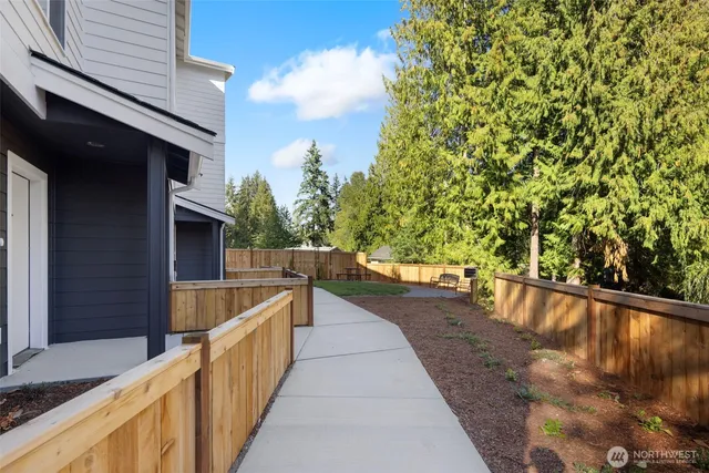 a view of balcony and yard
