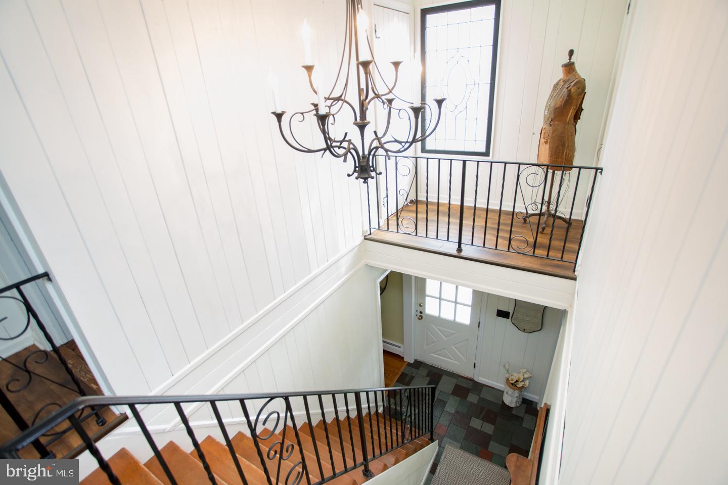 4774 Lower Mountain Road New Hope, PA 18938 - Photo 12 of 26 Iron staircase & chandelier; view of crossover