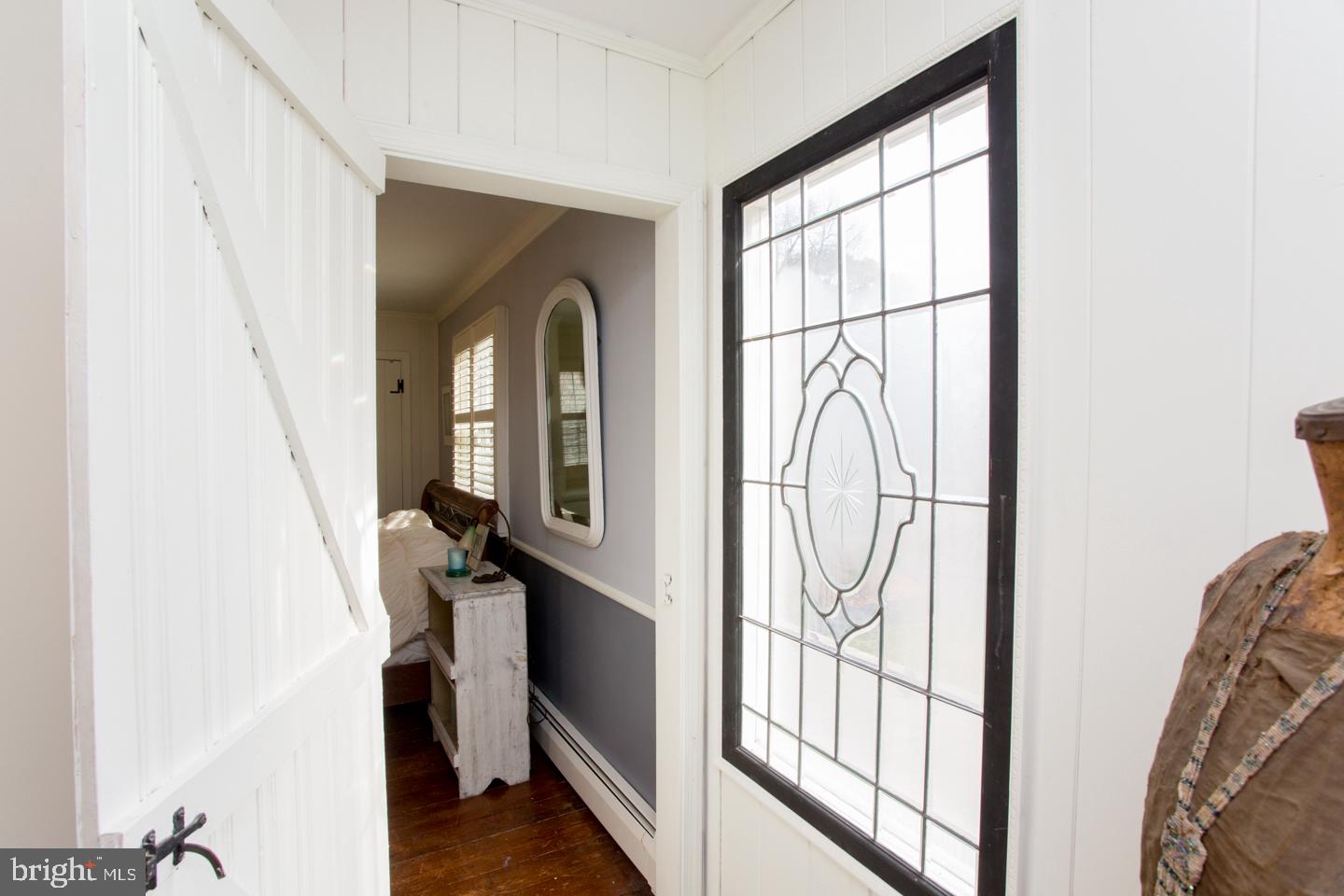 4774 Lower Mountain Road New Hope, PA 18938 - Photo 15 of 26 Leaded glass window on crossover between BRs