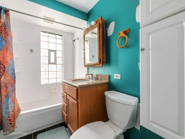 a bathroom with a sink toilet and bathtub