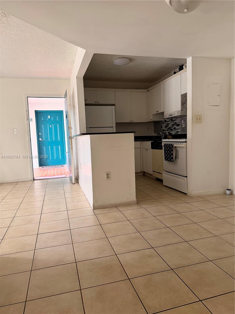 7100 Northwest 179th Street, Unit 104 Hialeah, FL 33015 - Photo 6 of 17