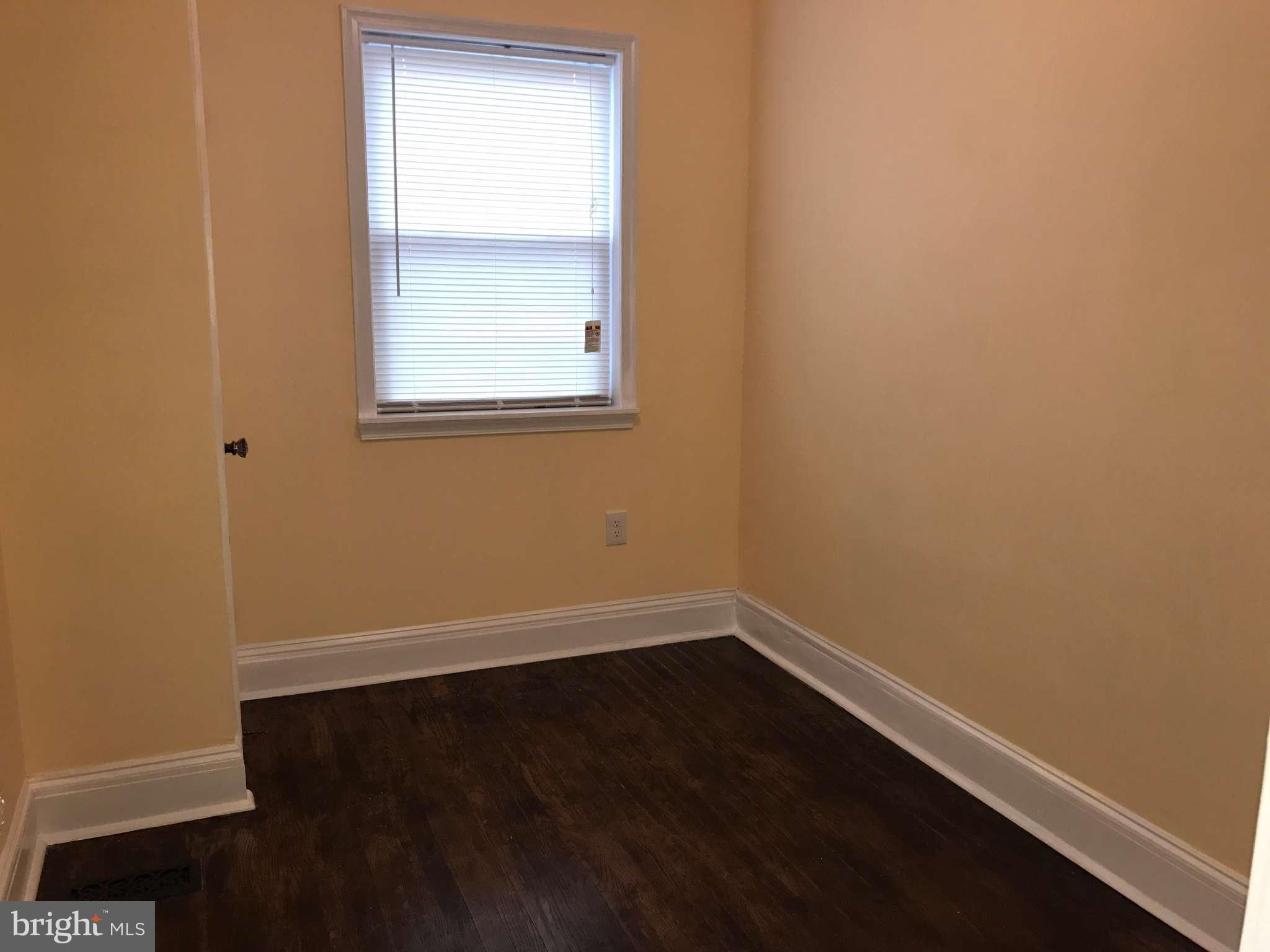 3733 Elkader Road Baltimore, MD 21218 - Photo 19 of 26 an empty room with a window