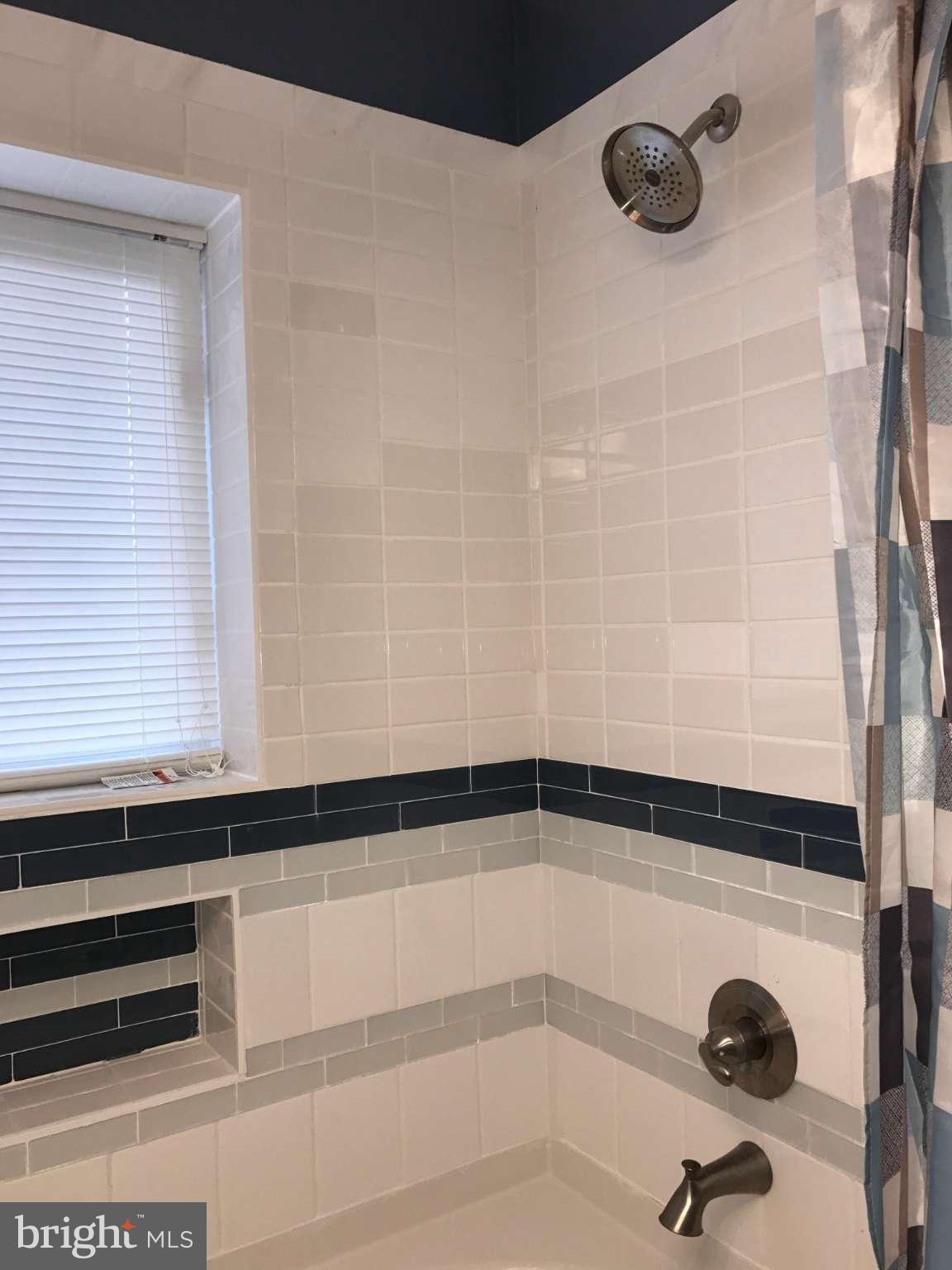 3733 Elkader Road Baltimore, MD 21218 - Photo 21 of 26 a bathroom with a shower