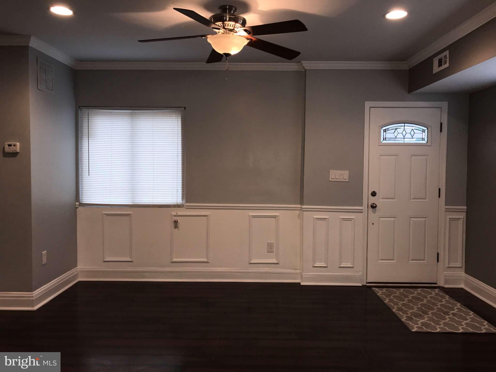 3733 Elkader Road Baltimore, MD 21218 - Photo 25 of 26 a view of an empty room with a window
