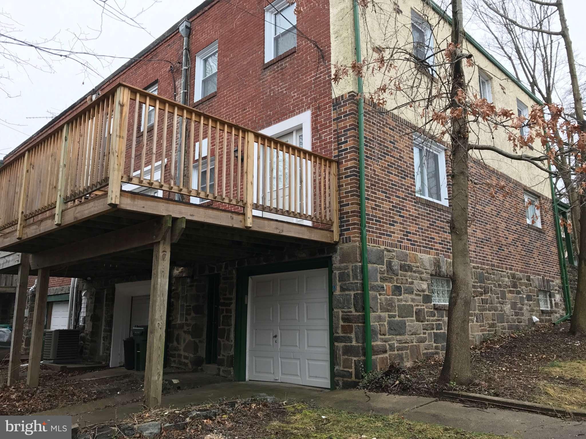 3733 Elkader Road Baltimore, MD 21218 - Photo 8 of 26 a view of a house with a street