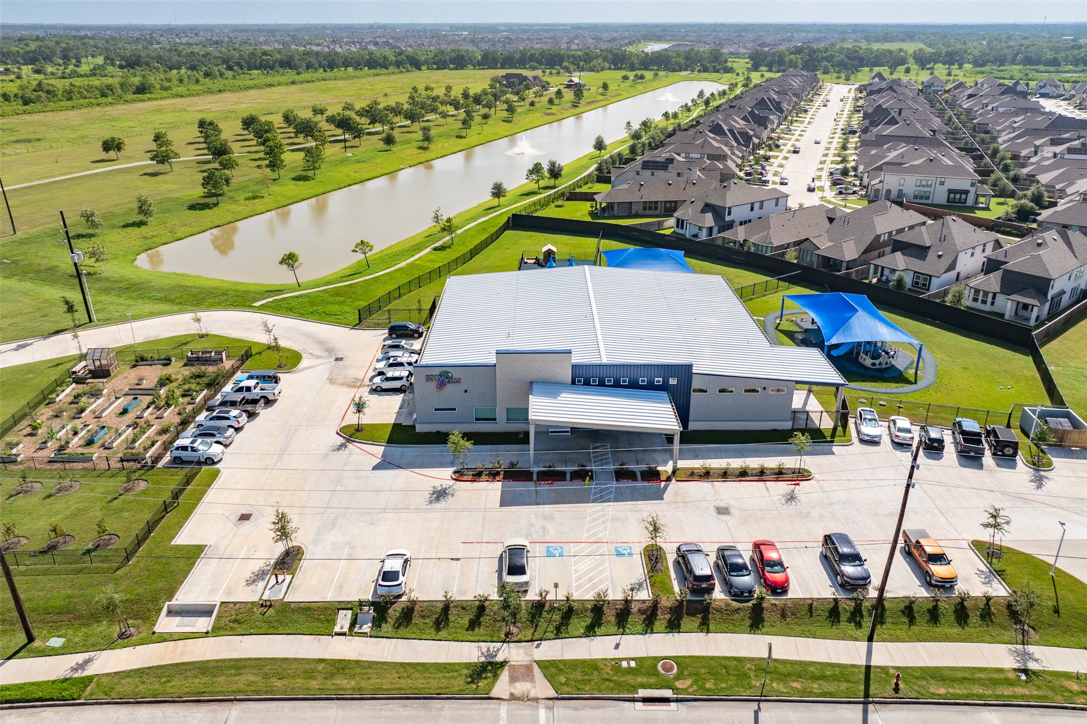 3519 Bay Drive Rosharon, TX 77583 - Photo 44 of 49 Explorers Academy which is located in the heart of Meridiana, which is a preschool and day care and i owned and operated by a resident here in Meridiana