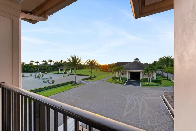 a view of a patio with a yard