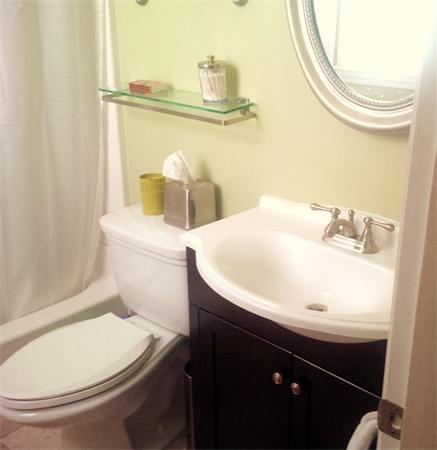 16 Beacon Street, Unit 11 Chelsea, MA 02150 - Photo 13 of 14 a bathroom with a sink and a toilet