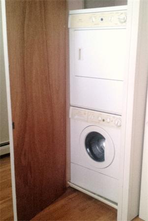 16 Beacon Street, Unit 11 Chelsea, MA 02150 - Photo 14 of 14 a utility room with dryer and washer