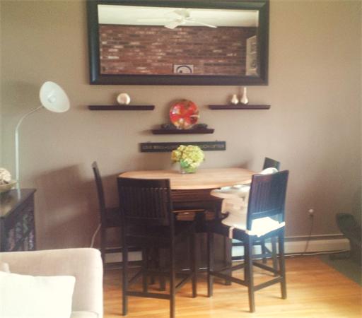 16 Beacon Street, Unit 11 Chelsea, MA 02150 - Photo 5 of 14 a view of a dining room with furniture and wooden floor