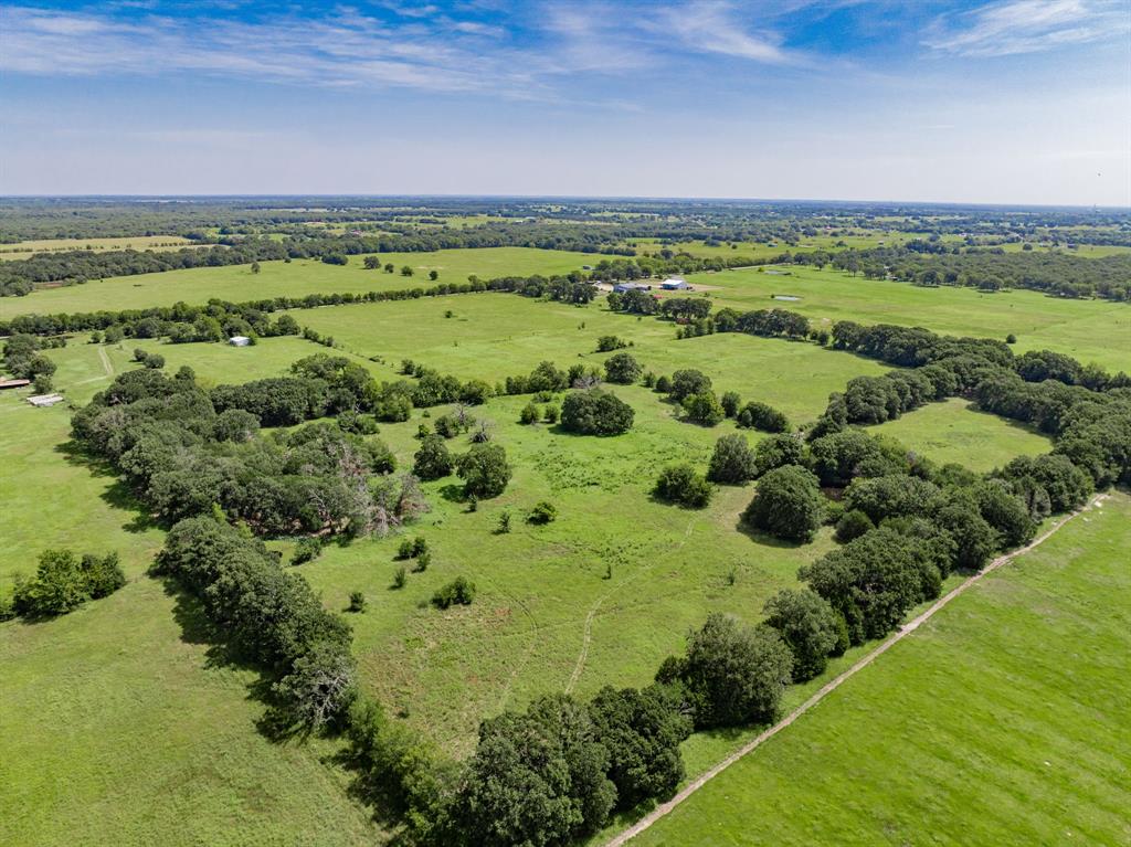 Lot 1 Cr-4064 Kemp, TX 75143 - Photo 7 of 15 a view of a green field with an ocean