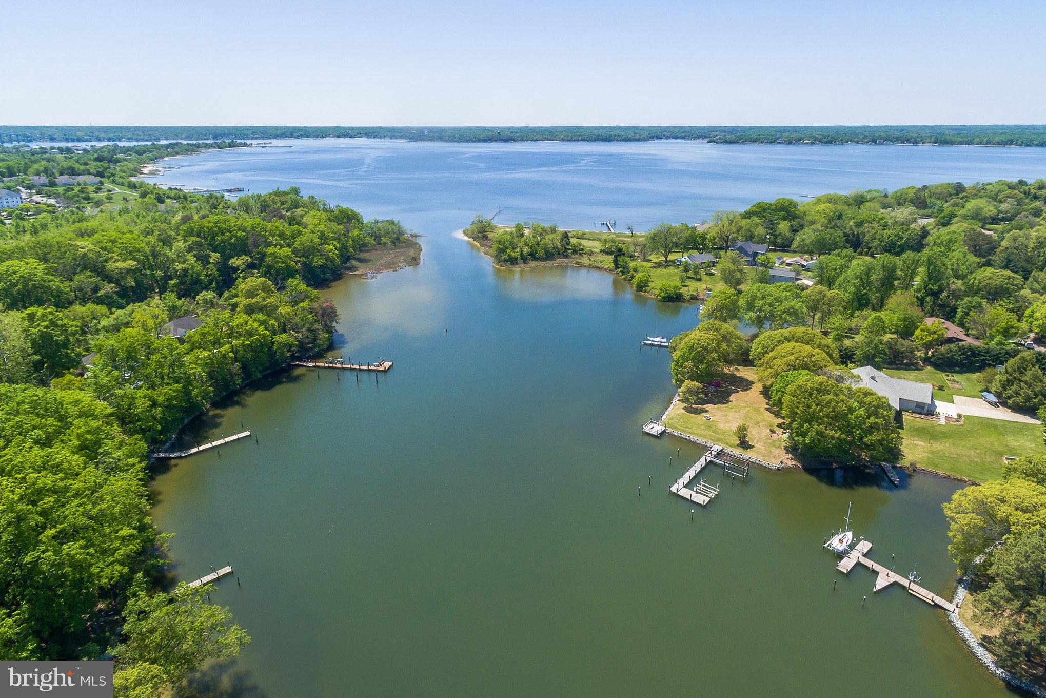 510 Swaggers Point Road Solomons, MD 20688 - Photo 2 of 30 an aerial view of a house with a lake view