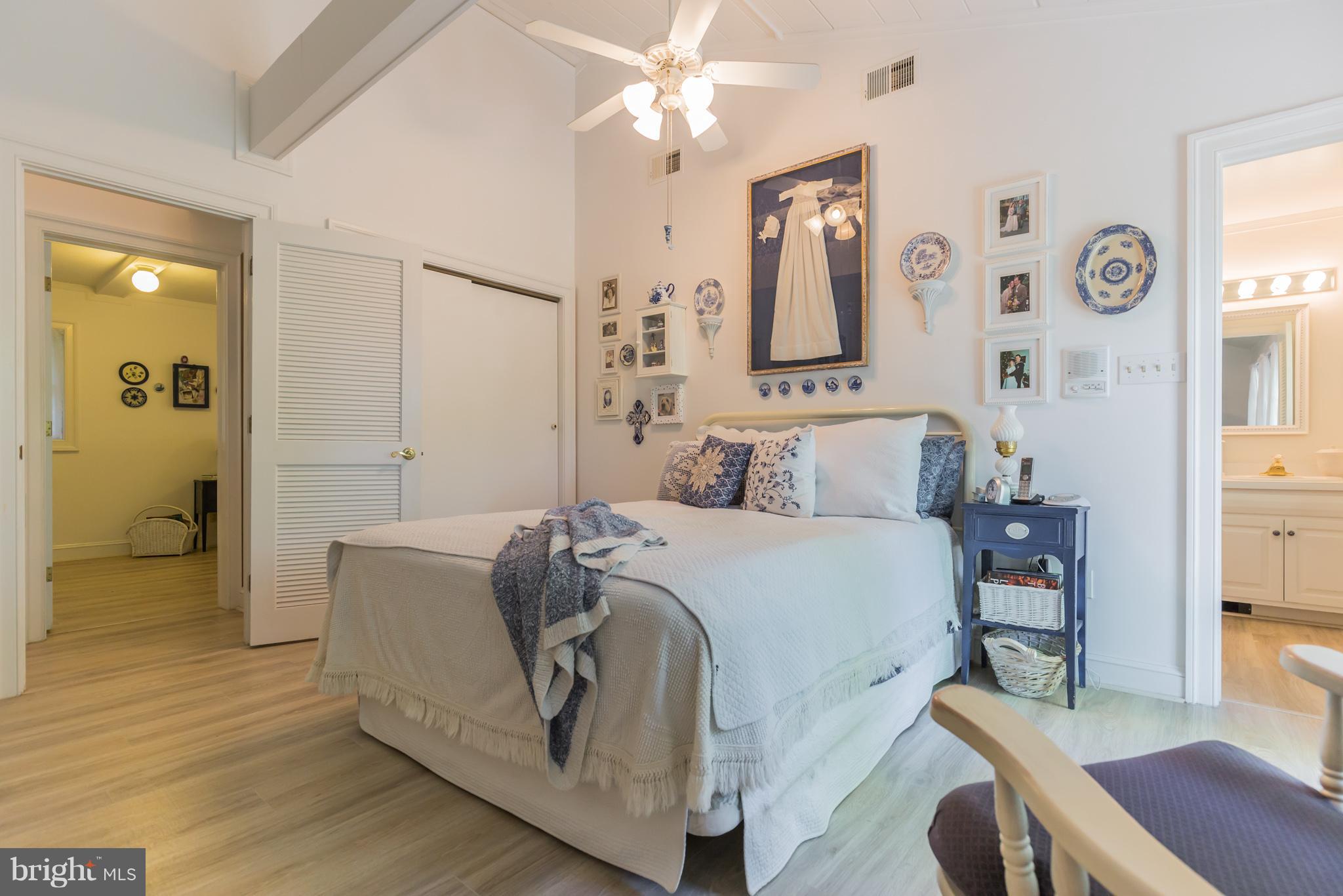 510 Swaggers Point Road Solomons, MD 20688 - Photo 14 of 30 a bed room with a bed and a furniture