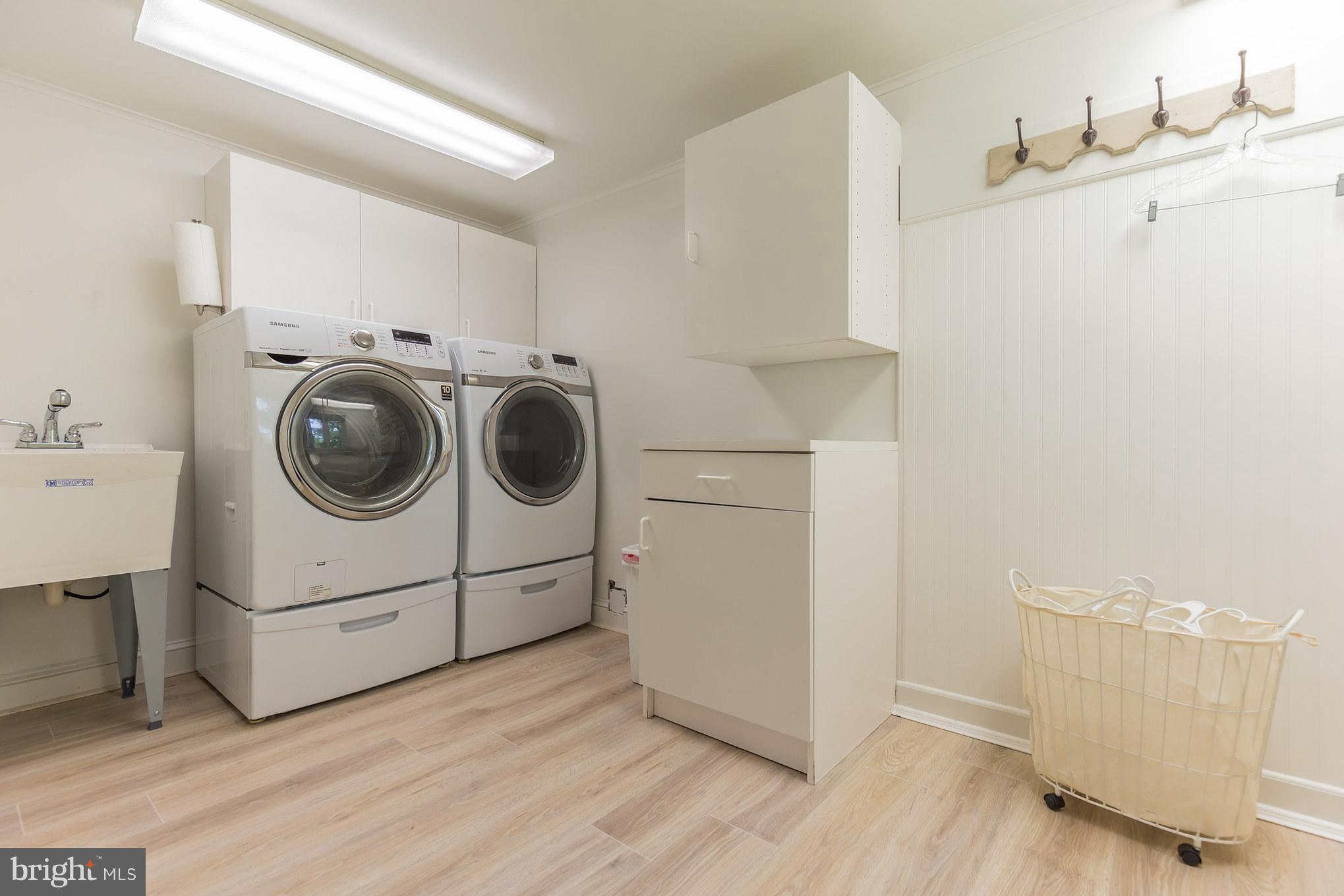 510 Swaggers Point Road Solomons, MD 20688 - Photo 24 of 30 a utility room with dryer and washer