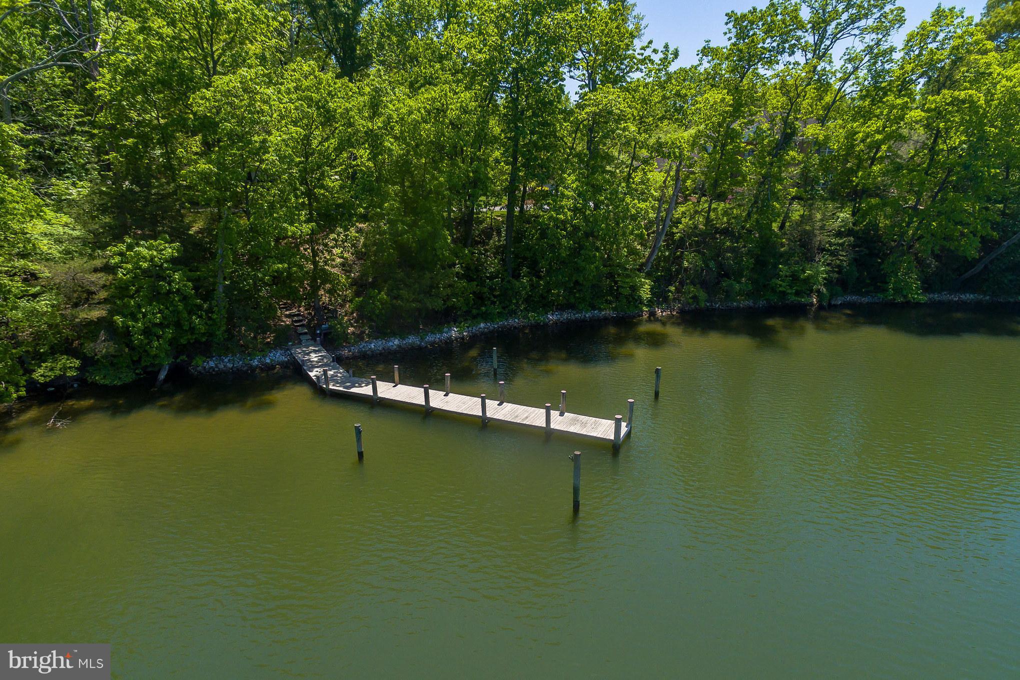 510 Swaggers Point Road Solomons, MD 20688 - Photo 27 of 30 a view of a lake with houses in outdoor space