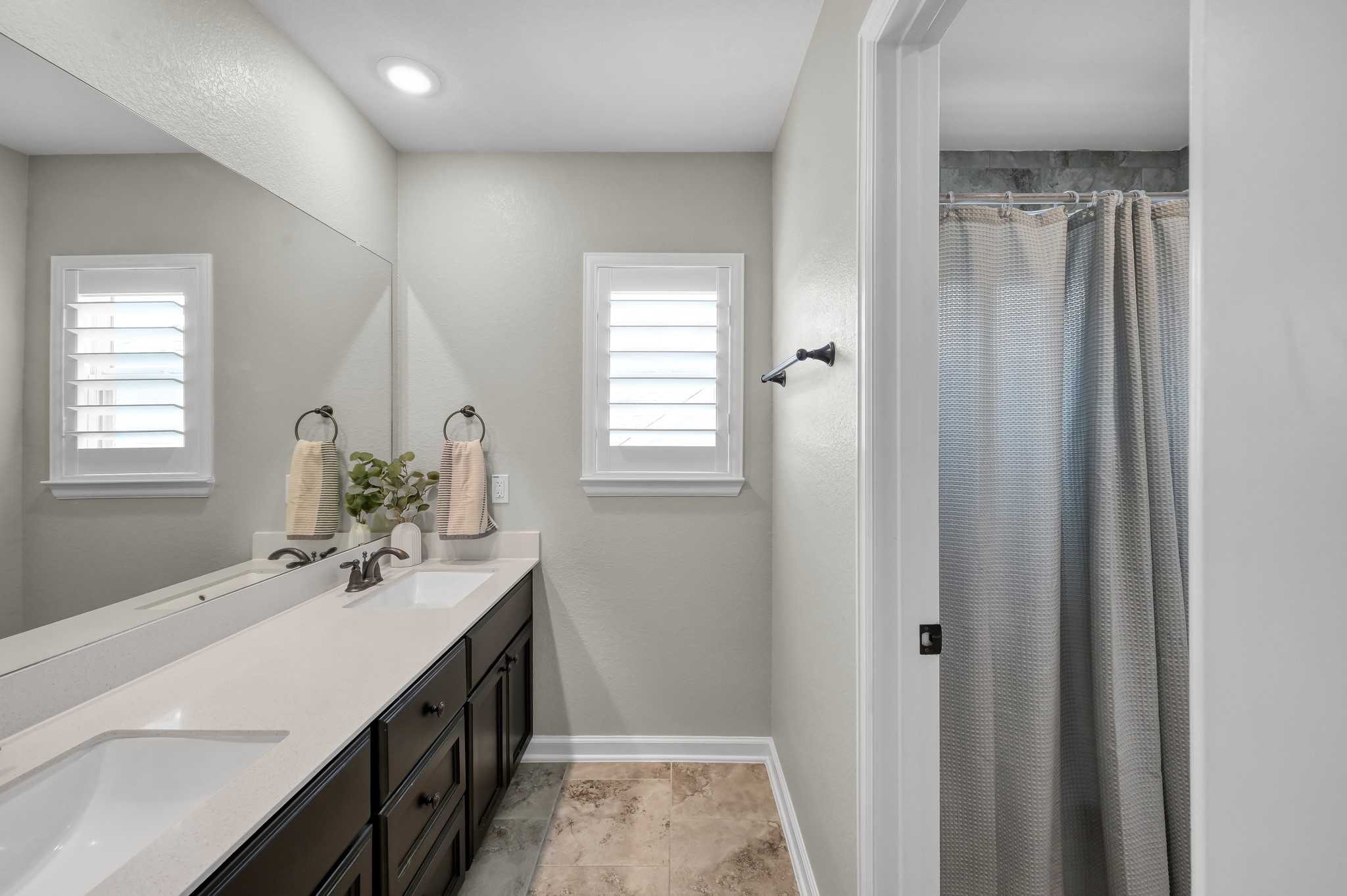 25015 Karacabey Court Spring, TX 77389 - Photo 41 of 49 Upstairs full bathroom 3.Shower and toilet are behind a door so multiple people can use at the same time