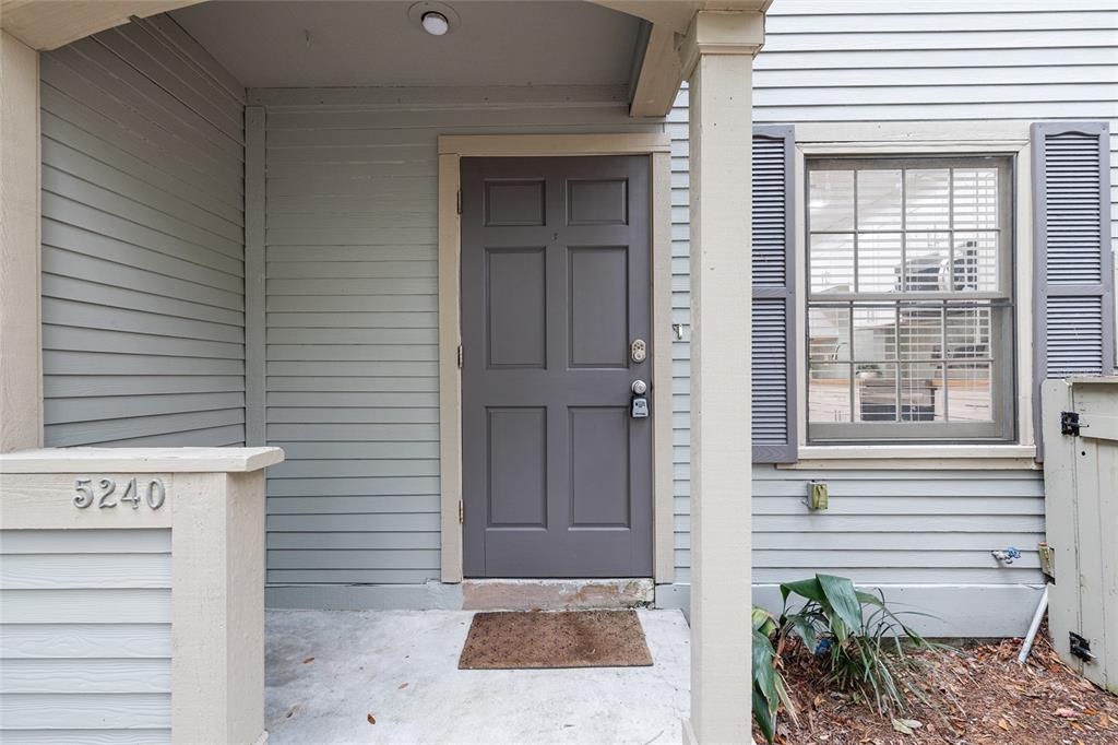 5240 Southwest 92nd Court Gainesville, FL 32608 - Photo 12 of 58 a view of a door and a window